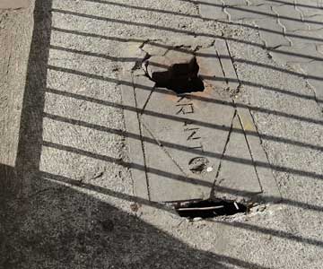 Hole in a Mumbie sidewalk Hole in a Mumbie sidewalk